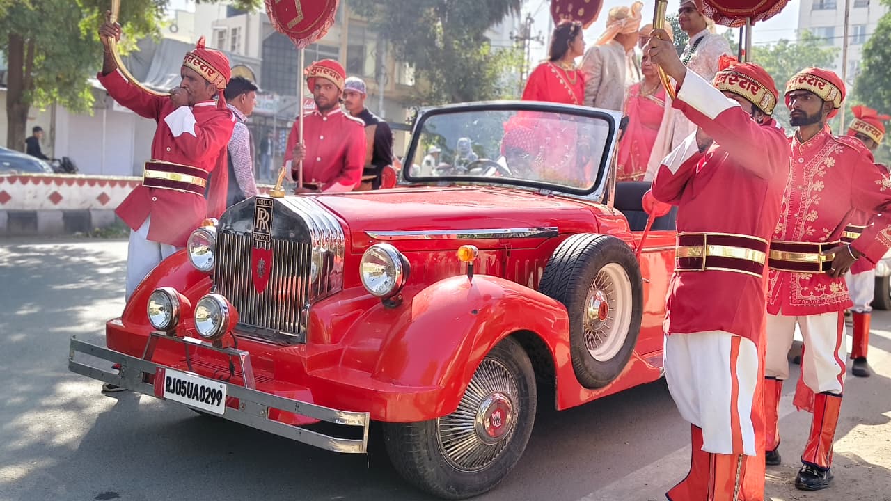 Red Rolls-Royce, chauffeur-driven vintage car